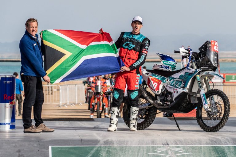 Charan Moore flying our South African flag high at Dakar 2023COMPR